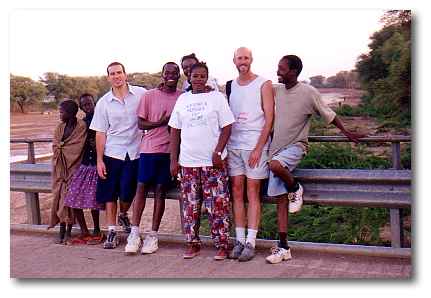 The early morning Kakuma jogging group pauses for a photo on the usually dry riverbed bridge