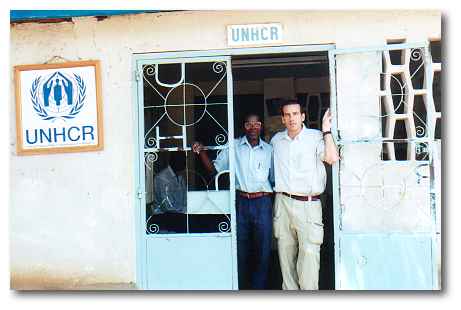 Terry and the UNHCR office guard, John, at the entrance to the UNHCR office in Kakuma